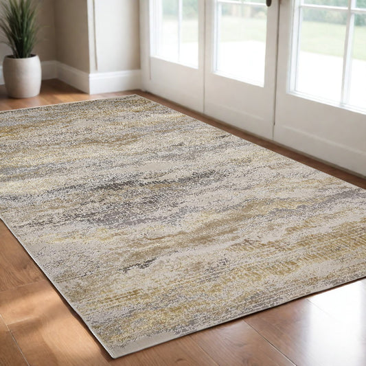 2' X 3' Gold Gray And Ivory Abstract Stain Resistant Area Rug - 48.0" (L) x 72.0" (W) x 0.63" (H)