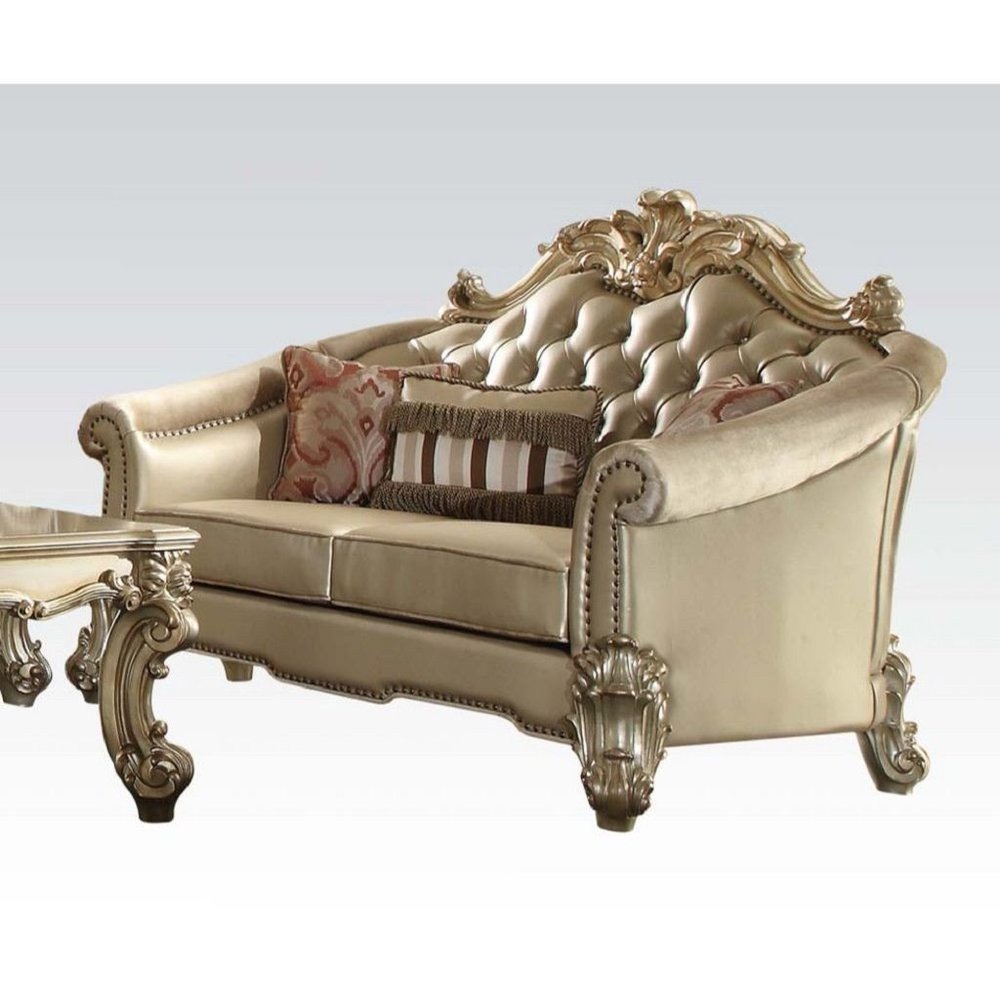 67" Bone And Gold Faux Leather Loveseat and Toss Pillows HomeRoots