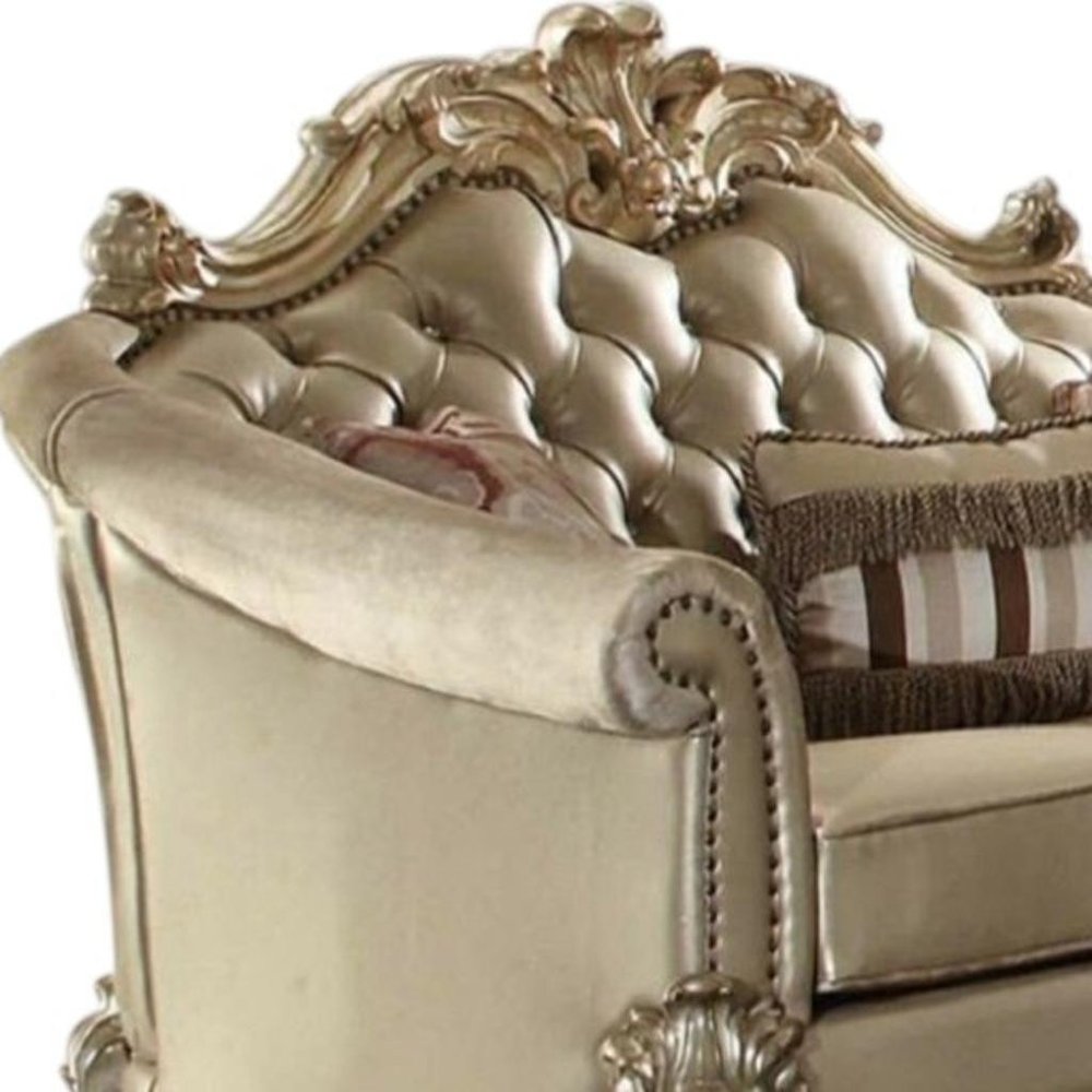 67" Bone And Gold Faux Leather Loveseat and Toss Pillows HomeRoots