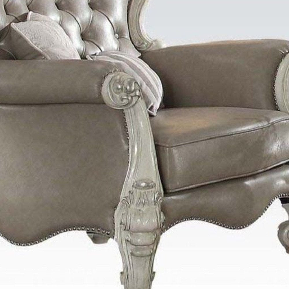 43" Gray and Bone Faux Leather Tufted Chesterfield Chair And Toss Pillows HomeRoots
