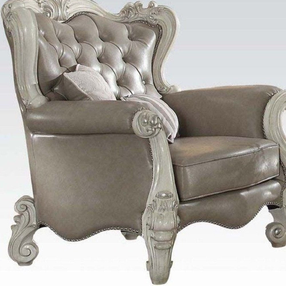 43" Gray and Bone Faux Leather Tufted Chesterfield Chair And Toss Pillows HomeRoots