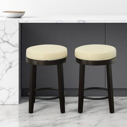 Set of Two 24" Cream and Espresso Faux Leather and Solid Wood Backless Counter Height Swivel Bar Chairs HomeRoots