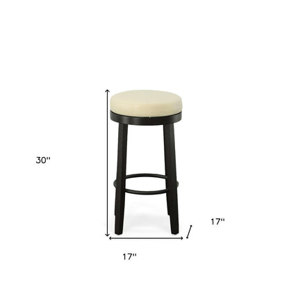 Set of Two 30" Cream and Espresso Faux Leather and Solid Wood Backless Bar Height Swivel Bar Chairs HomeRoots