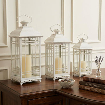 Set of Three Ivory Metal Mirrored Floor Lantern Candle Holders HomeRoots