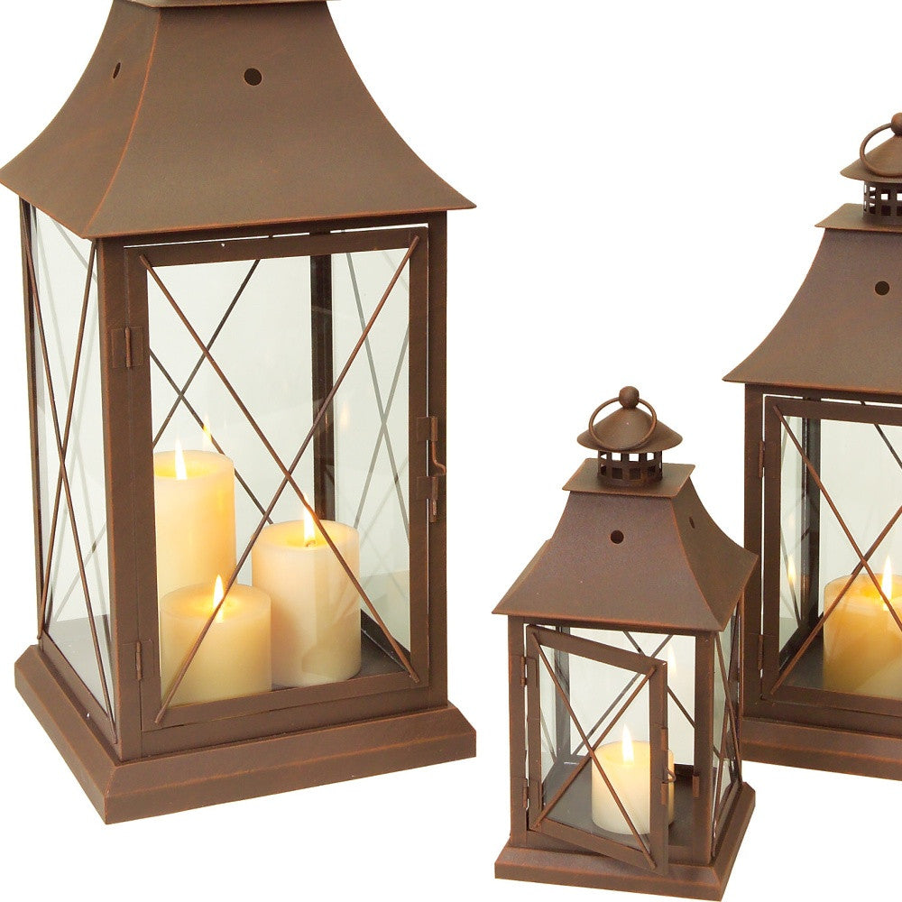 Set of Three Brown Glass and Metal Lattice Floor Lantern Candle Holders