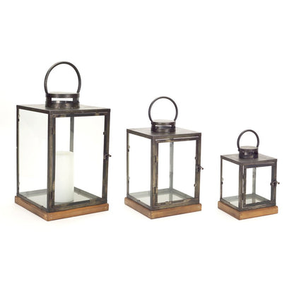 Set of Three Gray And Brown Distressed Geometric Glass Metal And Wood Floor Lantern Candle Holders HomeRoots