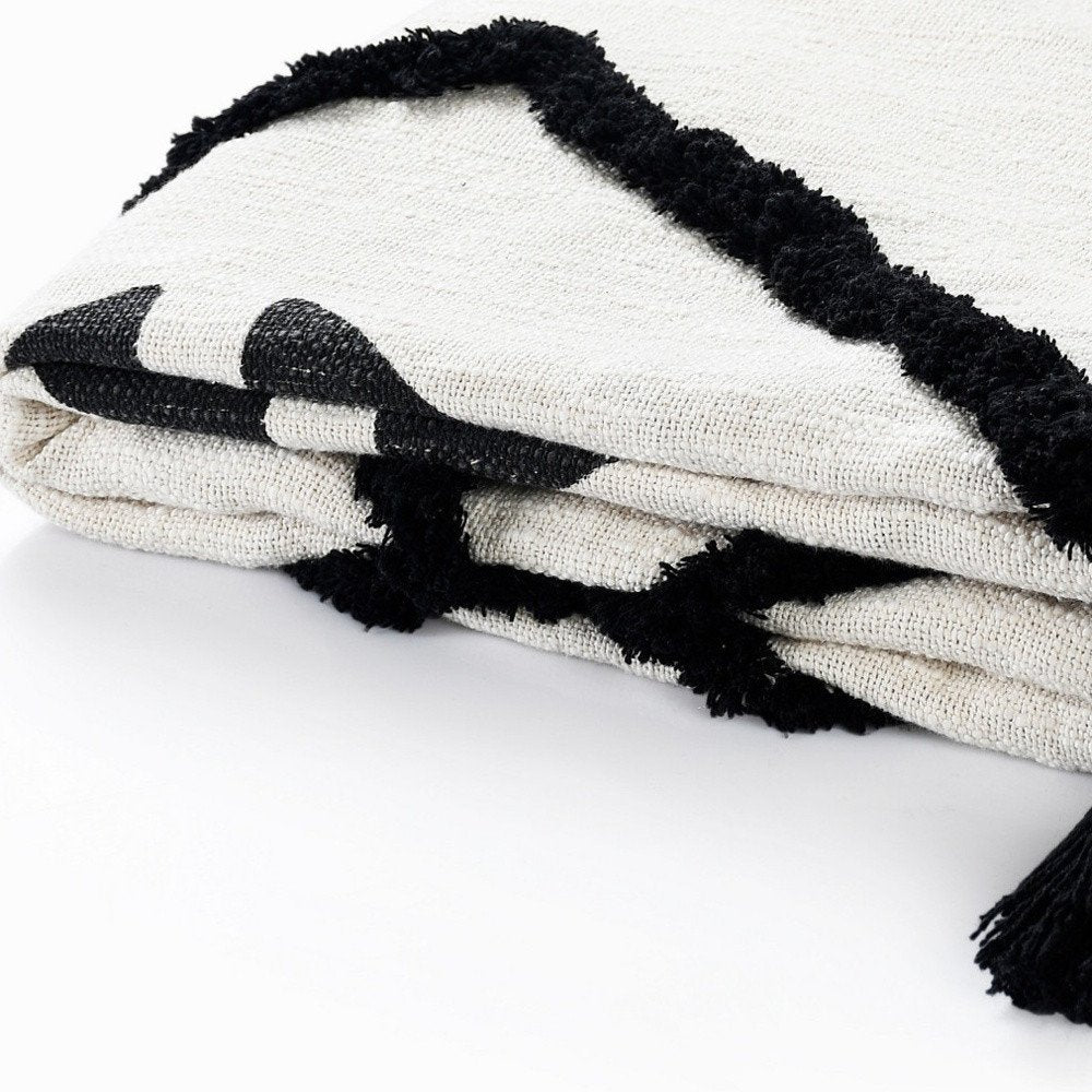50" X 60" Black and White Woven Cotton Geometric Throw Blanket with Tassels HomeRoots