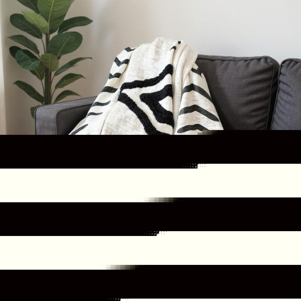 50" X 60" Black and White Woven Cotton Geometric Throw Blanket with Tassels HomeRoots