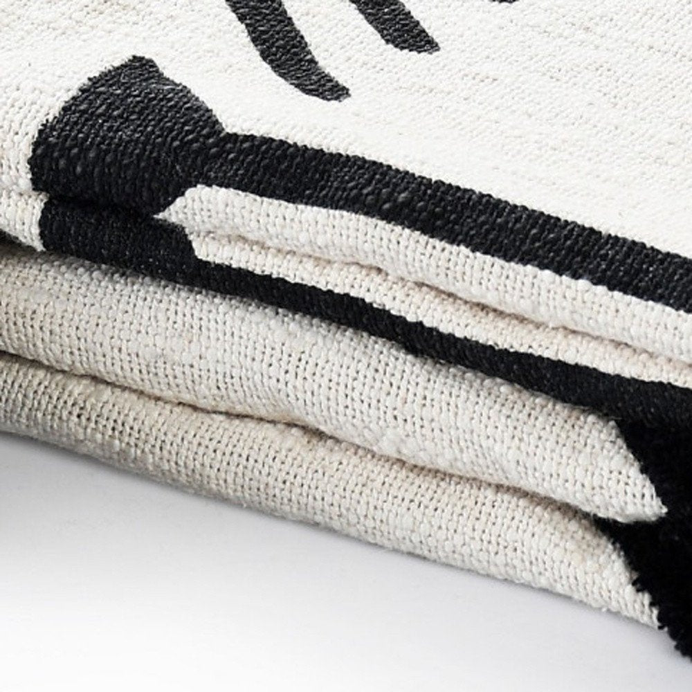 50" X 60" Black and White Woven Cotton Geometric Throw Blanket with Tassels HomeRoots
