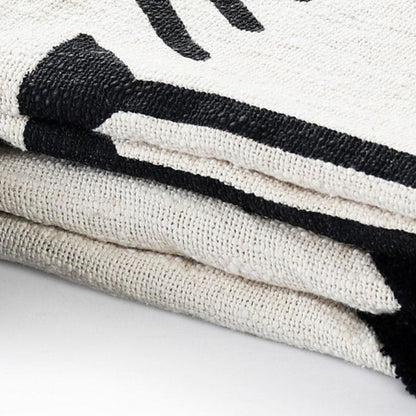50" X 60" Black and White Woven Cotton Geometric Throw Blanket with Tassels HomeRoots