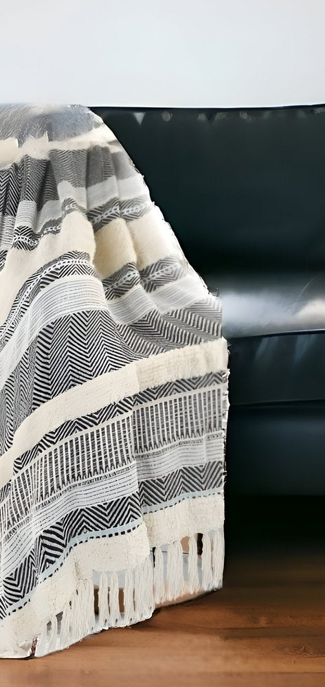 60" X 50" Cream Woven Cotton Herringbone Throw Blanket with Fringe HomeRoots