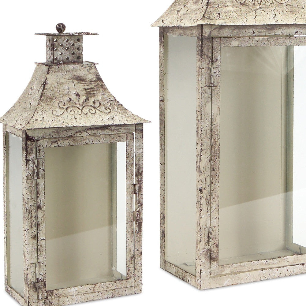 Set of Two Beige Iron and Glass Filigree Floor Lantern Candle Holders