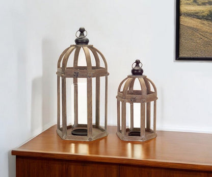 Set of Two Brown Distressed Wood And Glass Floor Lantern Candle Holders HomeRoots