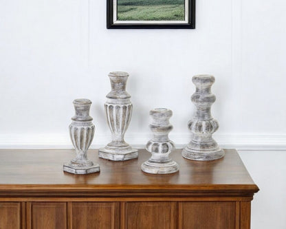 Set of Four White Washed Resin Tabletop Candle Sticks HomeRoots