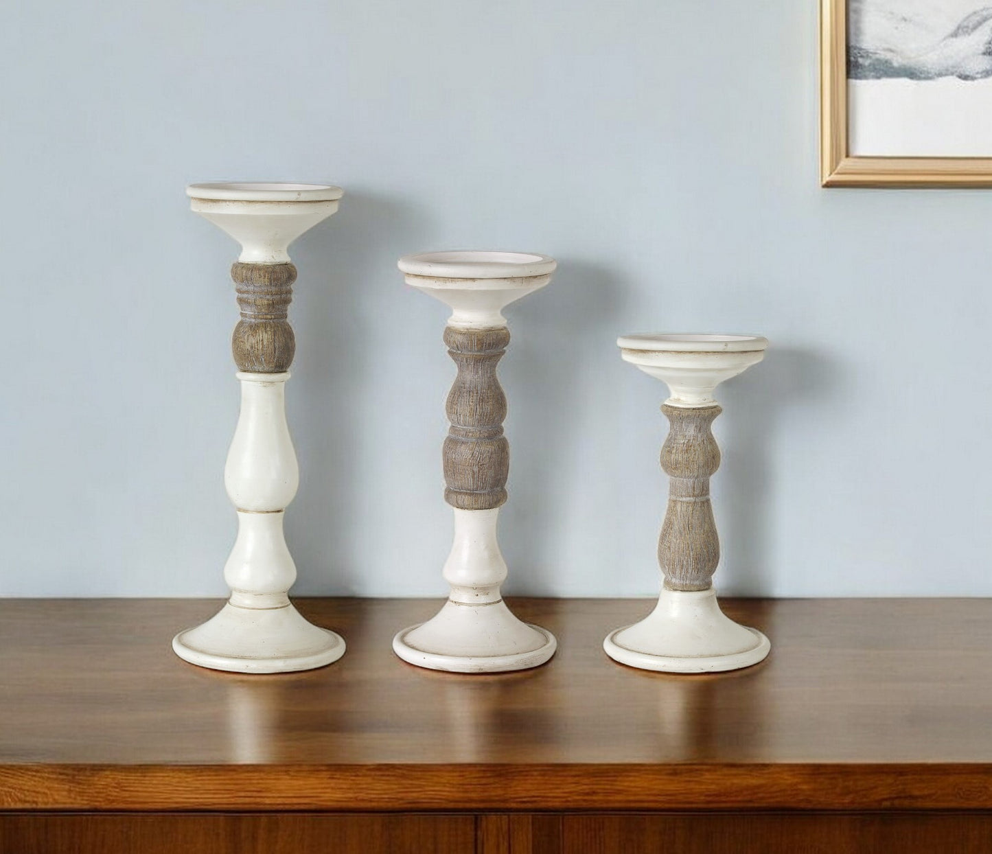 Set of Three Ivory and Natural Resin Tabletop Pillar Candle Holders