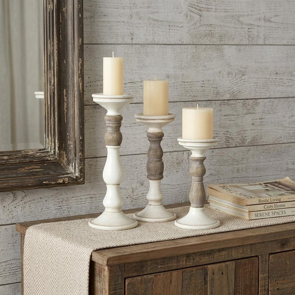 Set of Three Ivory and Natural Resin Tabletop Pillar Candle Holders HomeRoots