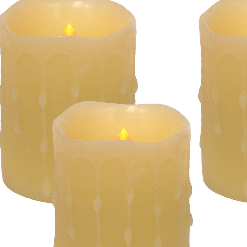 Set of Four Yellow Flameless Pillar Candles HomeRoots