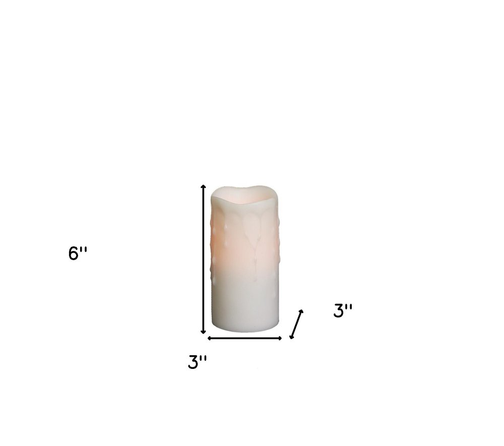 Set of Four Off White Flameless Pillar Candles HomeRoots