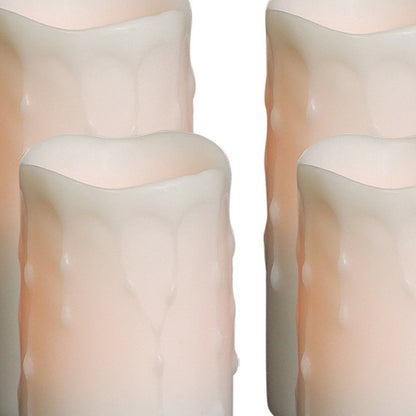 Set of Four Off White Flameless Pillar Candles HomeRoots