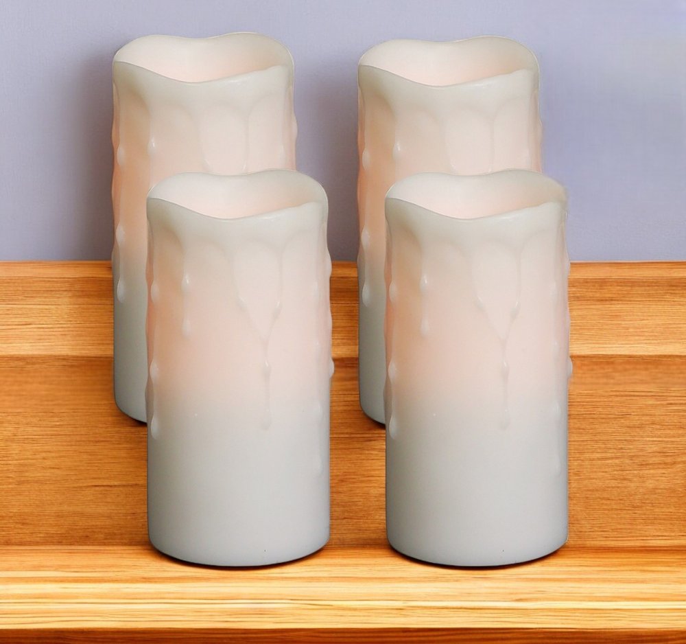 Set of Four Off White Flameless Pillar Candles HomeRoots