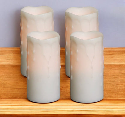 Set of Four Off White Flameless Pillar Candles HomeRoots