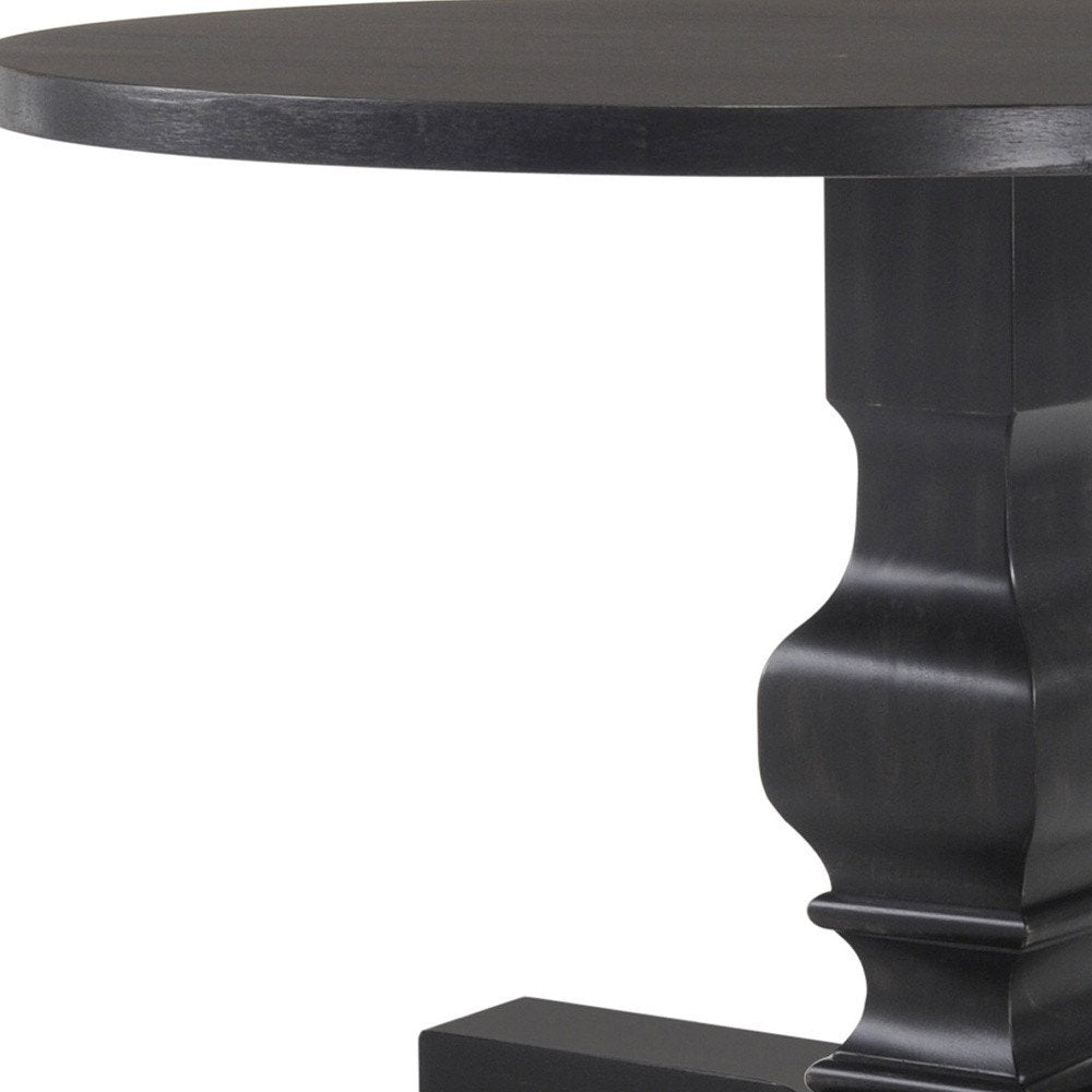 47" Black Rounded Solid Wood Pedestal Base Dining Table HomeRoots