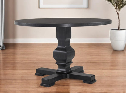 47" Black Rounded Solid Wood Pedestal Base Dining Table HomeRoots