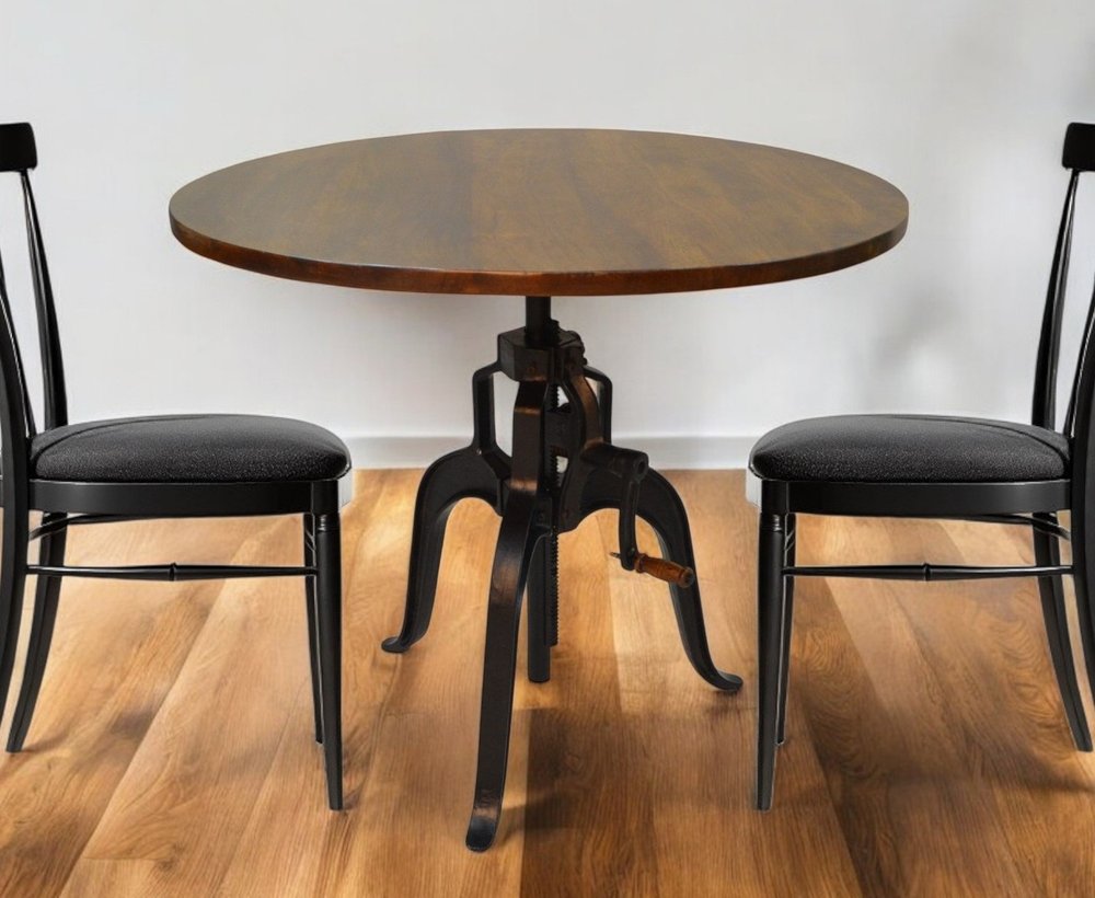 Adjustable Height Brown And Black Solid Wood And Iron Pedestal Base Round Top Dining Table HomeRoots