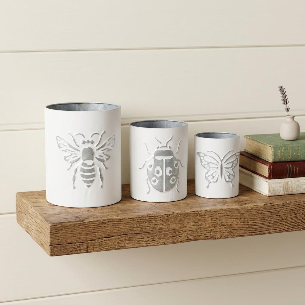 Set of Three White And Gray Metal 9 Ounce Abstract Round Distressed Pot Planters HomeRoots