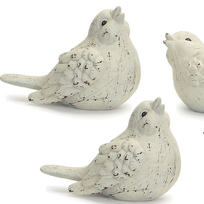 Set of Four Ivory Ceramic Bird Figurines HomeRoots