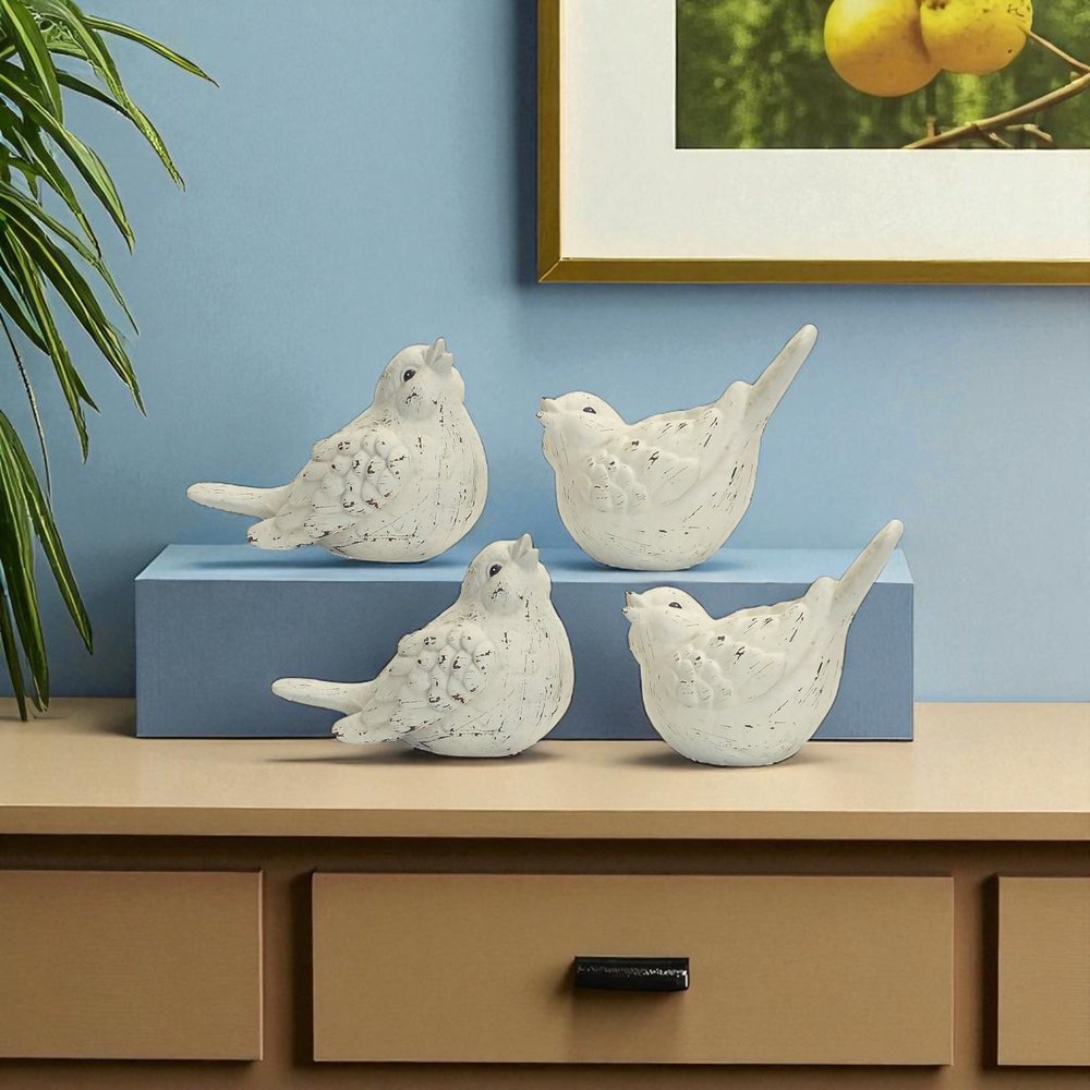 Set of Four Ivory Ceramic Bird Figurines HomeRoots