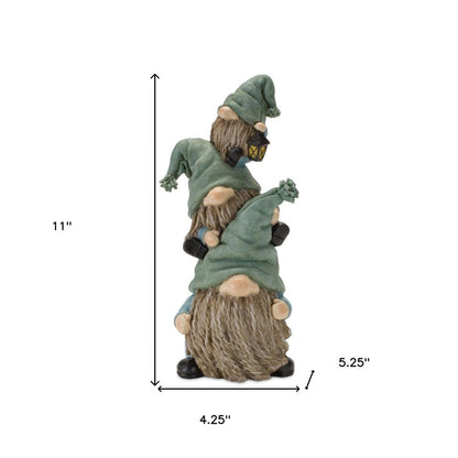 Set of Two 11" Blue and Green Polyresin Christmas Figurine Tabletop Sculpture HomeRoots
