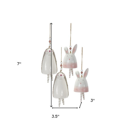 Set of Four 7" Pink And White Resin Hedgehog Model Bell Tabletop Sculpture HomeRoots