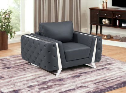 50" Dark Gray and Silver Faux Leather Tufted Arm Chair