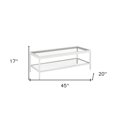 45" Clear Glass And White Steel Coffee Table With Shelf - FurniFindUSA