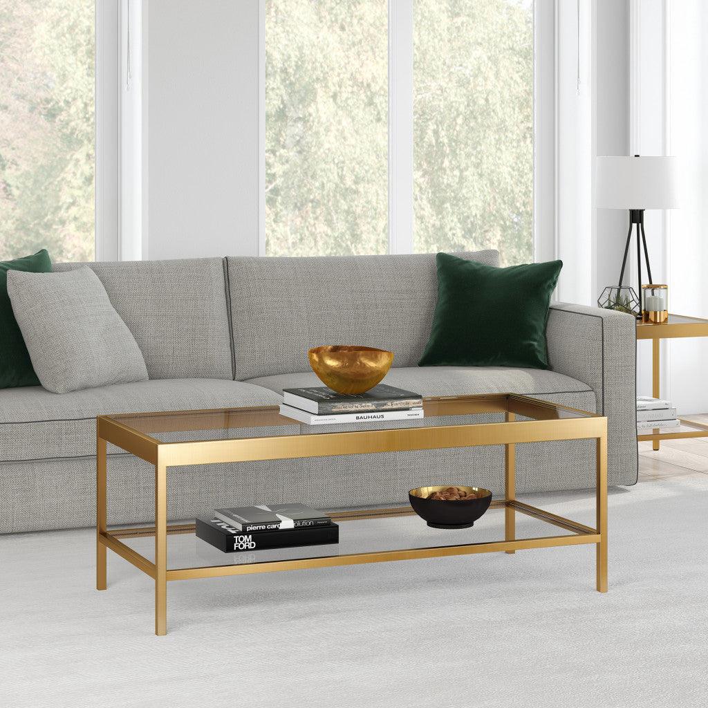 45" Clear Glass And Gold Steel Coffee Table With Shelf - FurniFindUSA