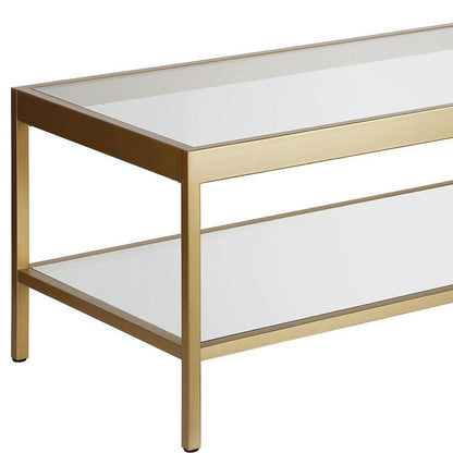 45" Clear Glass And Gold Steel Coffee Table With Shelf - FurniFindUSA