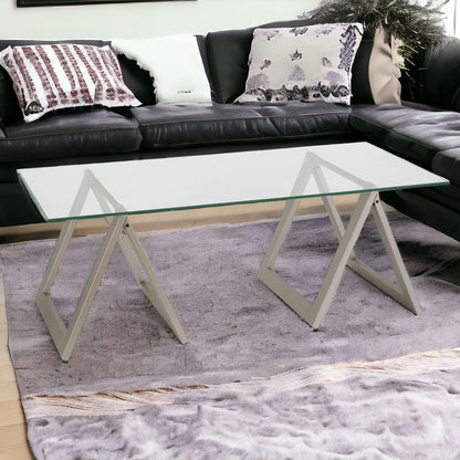 46" Clear Glass And Steel Coffee Table - FurniFindUSA