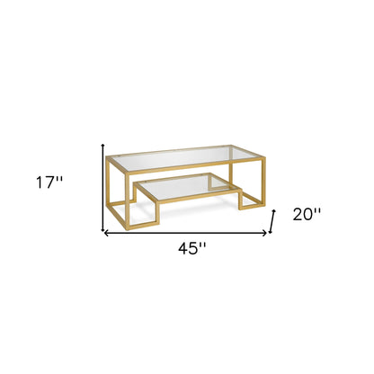 45" Clear And Gold Glass And Steel Coffee Table With Shelf