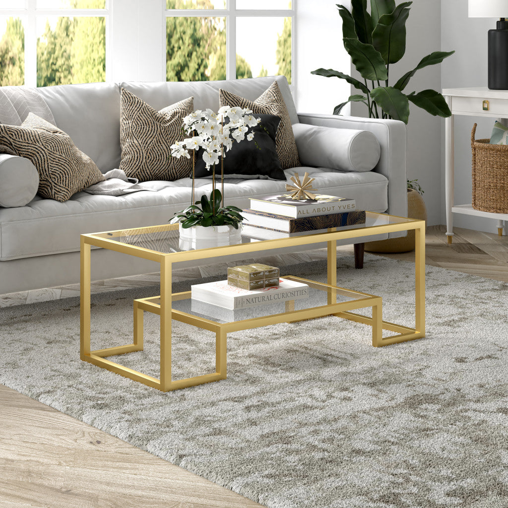 45" Clear And Gold Glass And Steel Coffee Table With Shelf