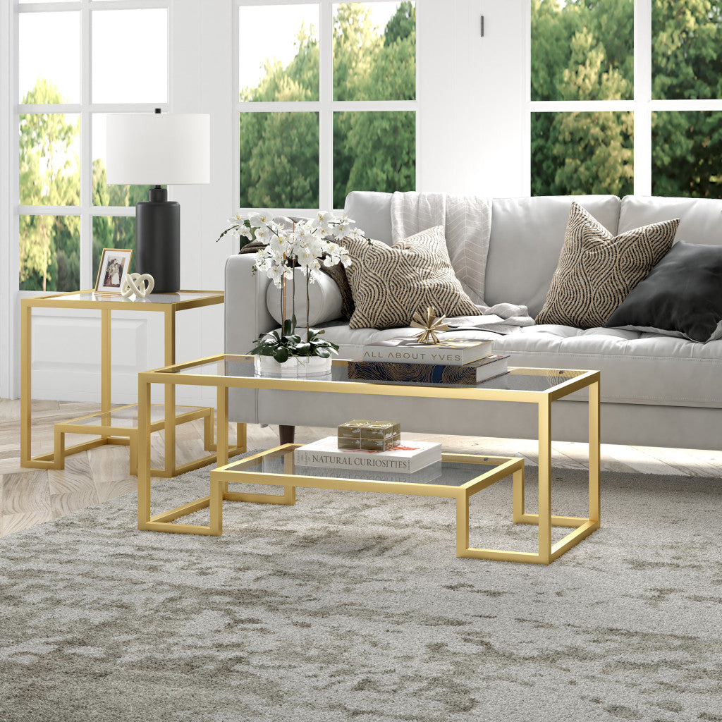 45" Clear And Gold Glass And Steel Coffee Table With Shelf