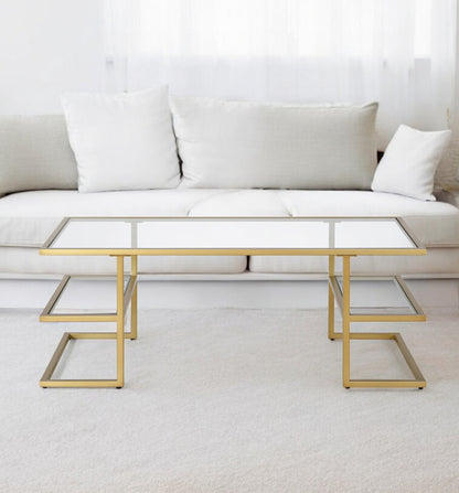 47" Gold Glass And Steel Coffee Table With Two Shelves