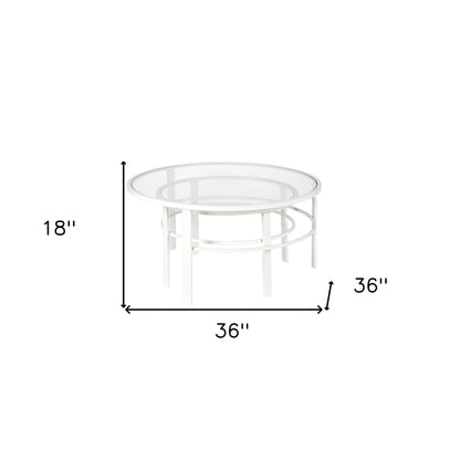 Set of Two 36" White Glass And Steel Round Nested Coffee Tables