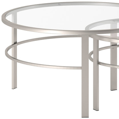 Set of Two 36" Clear and Silver Glass And Steel Round Nested Coffee Tables