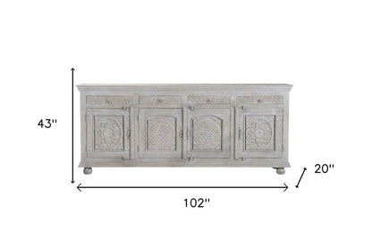 102" Gray Distressed Solid Wood Carved Floral Four Drawer Sideboard With Four Doors HomeRoots