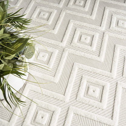 7' X 10' Ivory And White Indoor Outdoor Area Rug HomeRoots