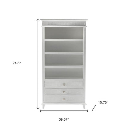 Antiqued White Solid Wood Four Tier Bookcase with Three Drawers HomeRoots