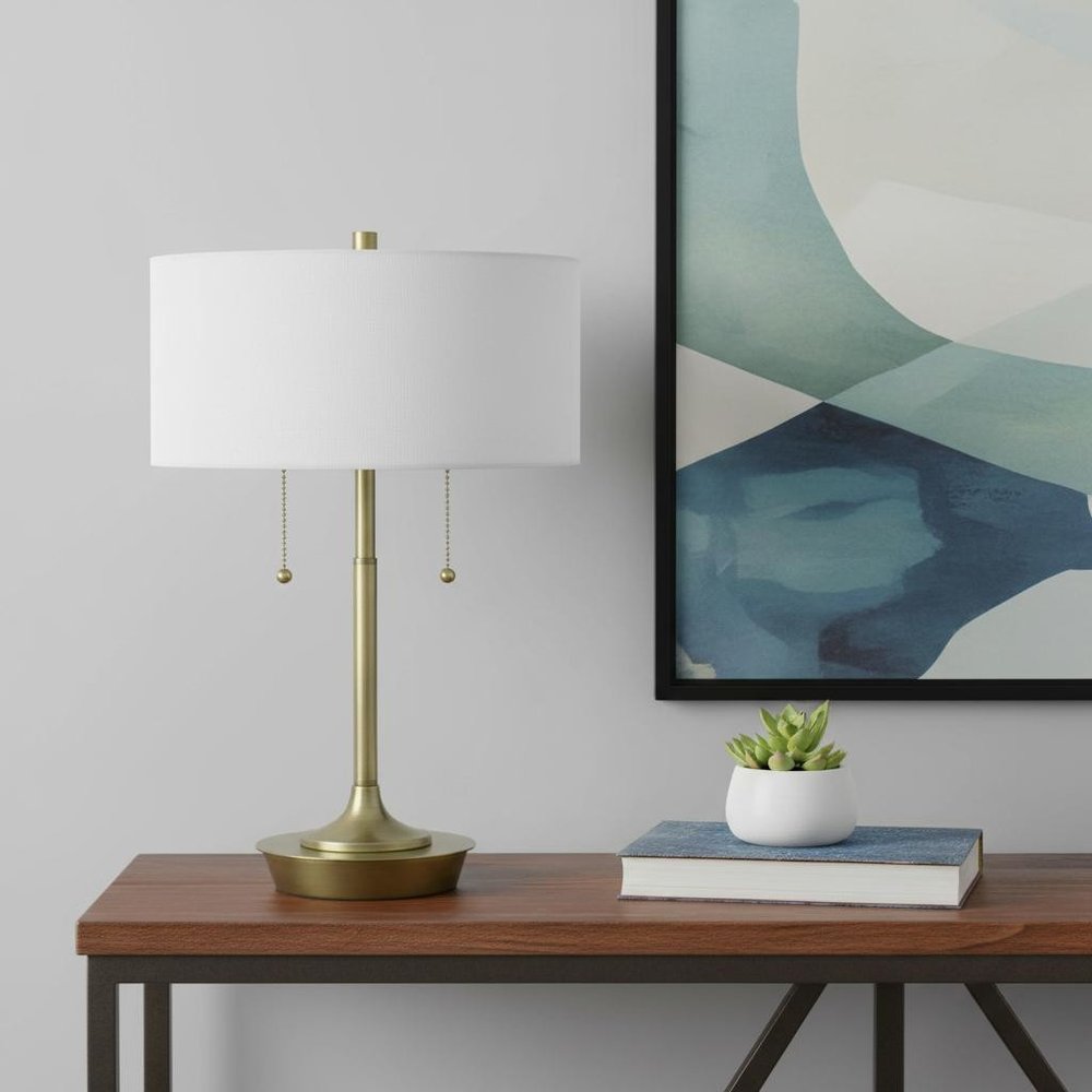 20" Antiqued Brass Metal Two Light Table Lamp With White Drum Shade HomeRoots