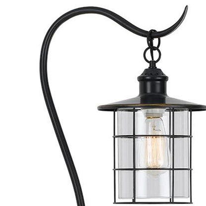 60" Antiqued Bronze Lantern Style Floor Lamp With Glass and Metal Shade HomeRoots