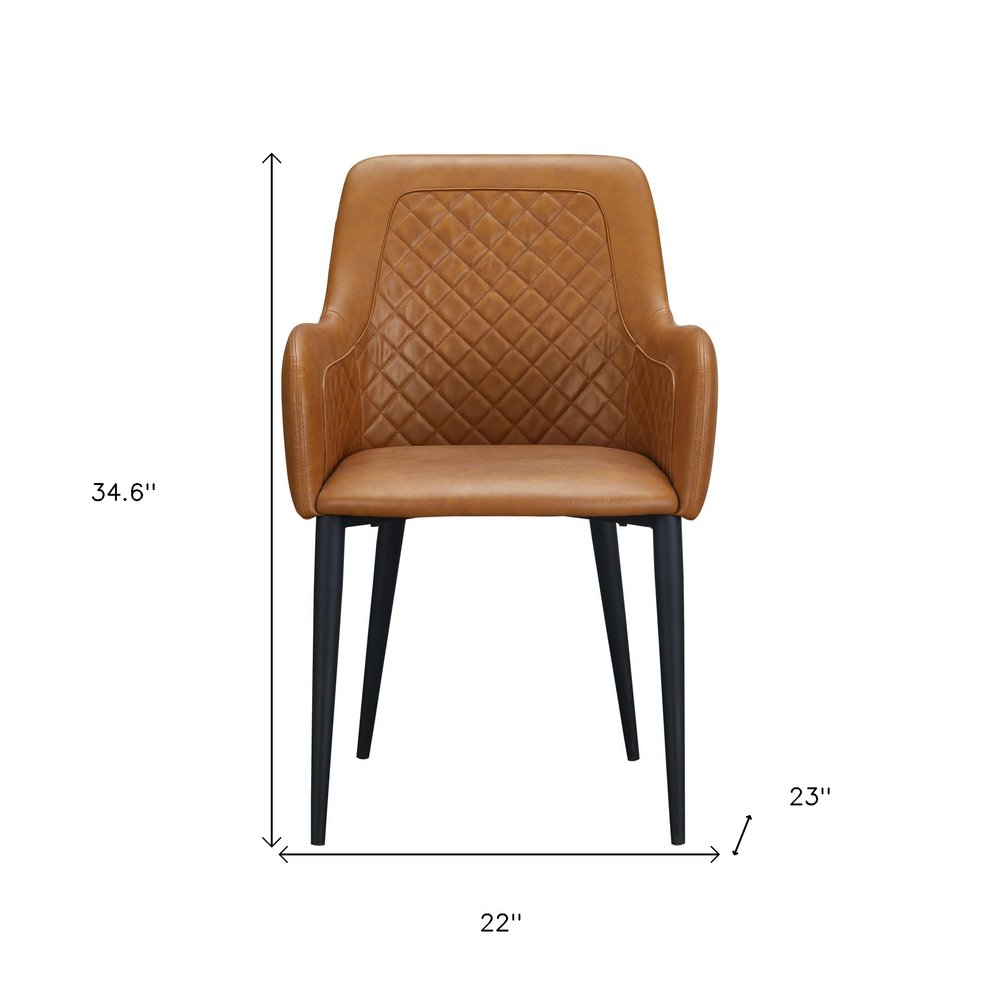 Set of Two Tan and Black Tufted Faux Leather Dining Arm Chairs HomeRoots
